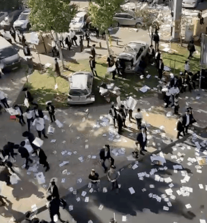 Flyers being thrown during the rally