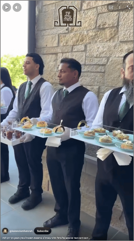 Uniformed waiters serving courses