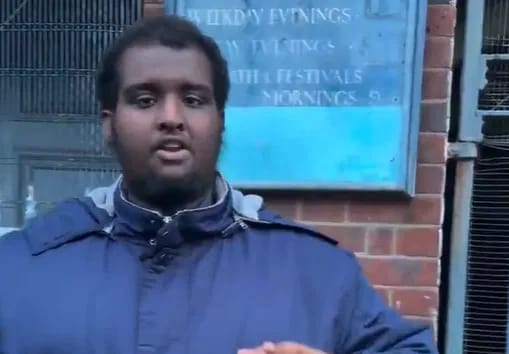 Local UK resident standing next to Nelson Street Synagogue