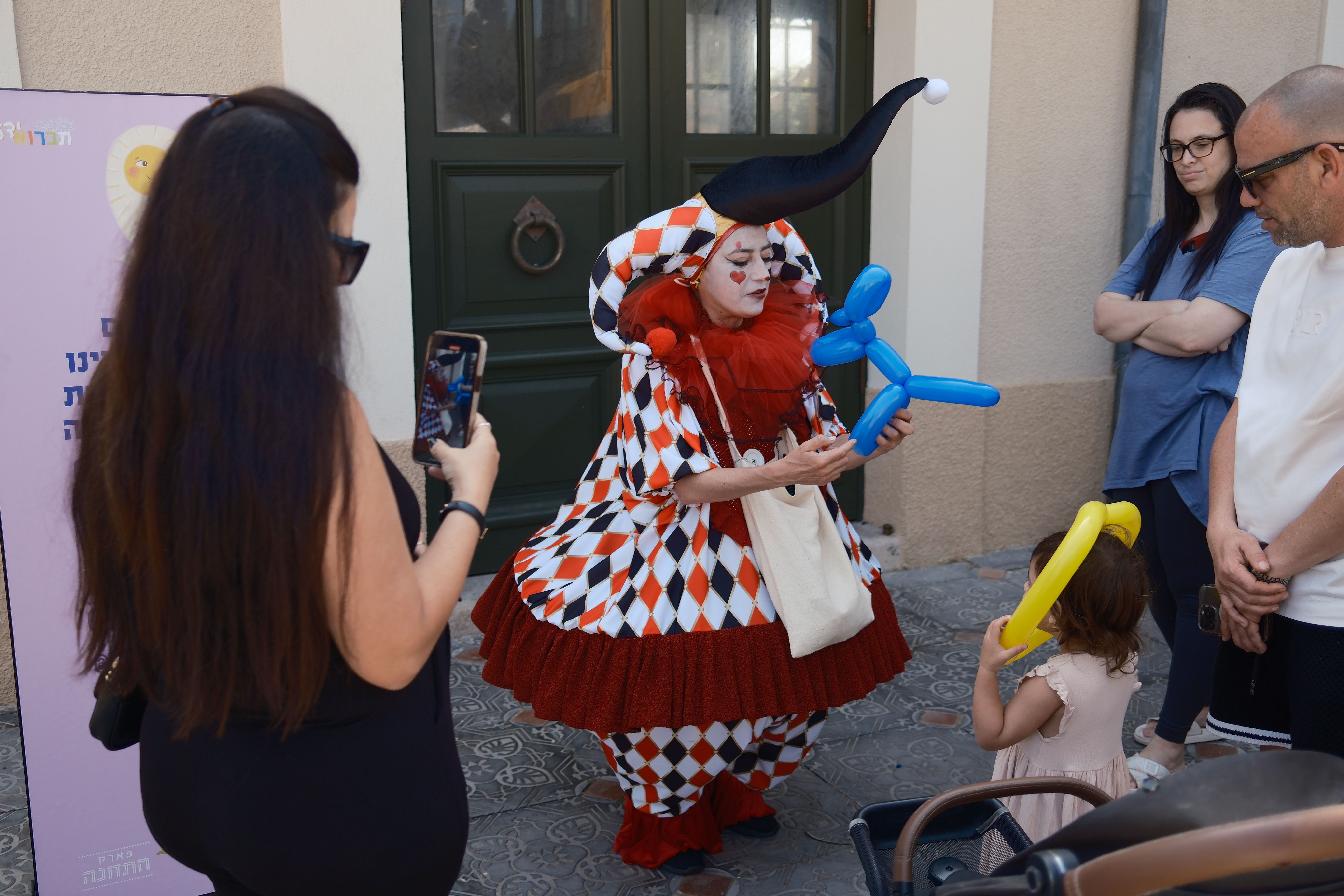 People wearing costumes celebrate the jewish holiday of Purim in Tel Aviv, March 15, 2025.
