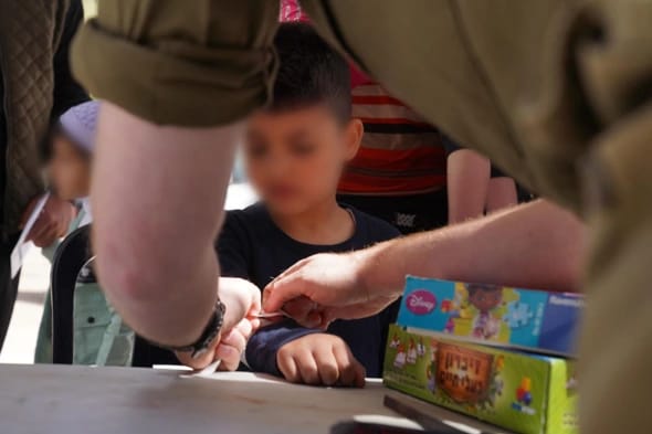 IDF treating civilians in Syria
