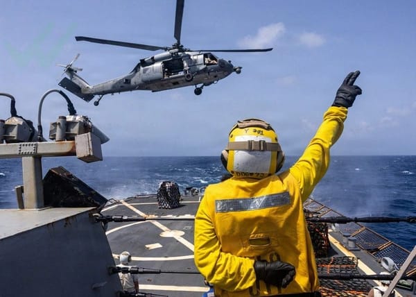 Helicopter taking off from the aircraft carrier