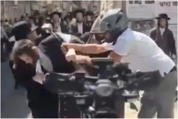 Scooter Rider Grabs Palestinian Flag from Neturei Karta March, Sparks Confrontation in Jerusalem
