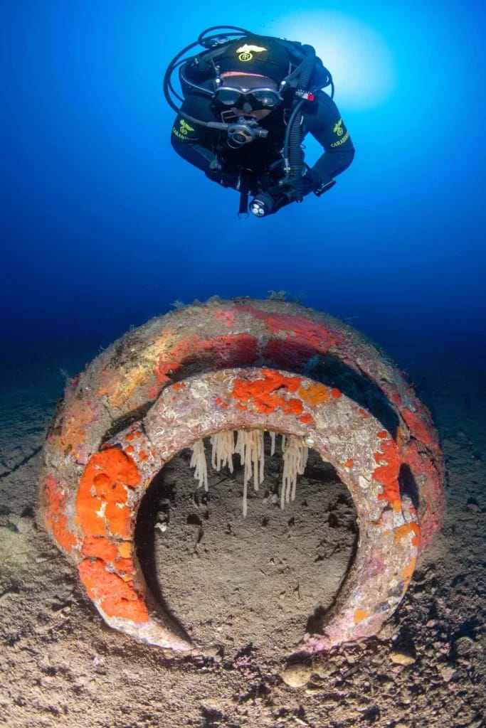 Diver next to the veseel that was discovered