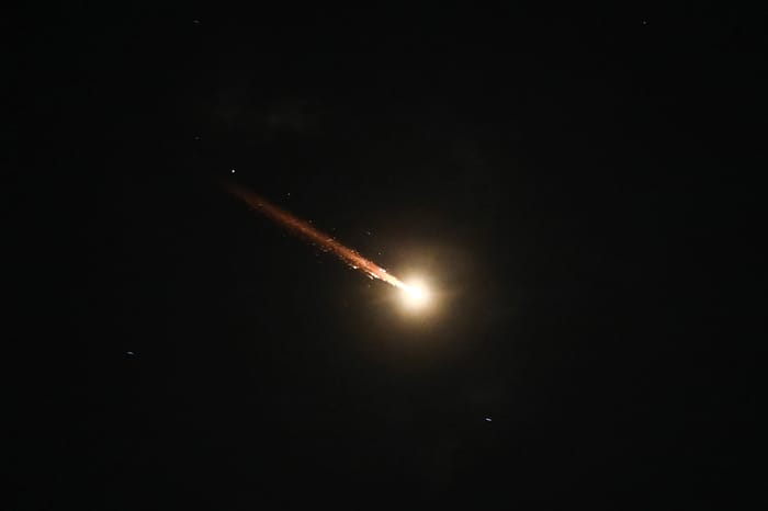 Anti-missile system fires interception missiles as drones and missiles fired from Iran, as it seen over the West Bank city of Hebron, on April 14, 2024. 