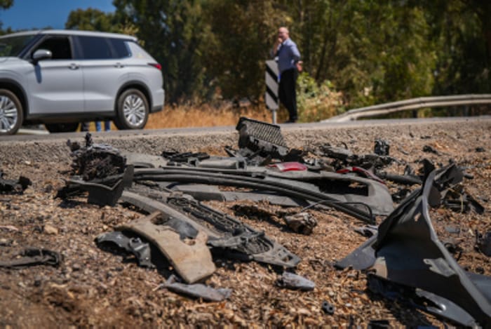The remains of the vehicle hit by a missile fired from Lebanon that killed Noa and Nir Baranes near Nafah Junction, in the Golan Heights, July 10, 2024.