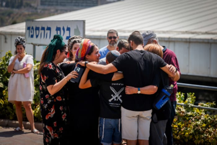 Family and friends attend the funeral of Yonatan Deutsch, at Har HaMenuchot Cemetery in Jerusalem, August 12, 2024.