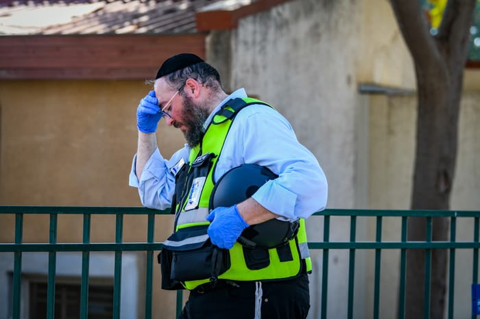 Member of the Zaka team seen near Kibbutz Kfar Aza, near the Israeli-Gaza border, in southern Israel, November 2, 2023.