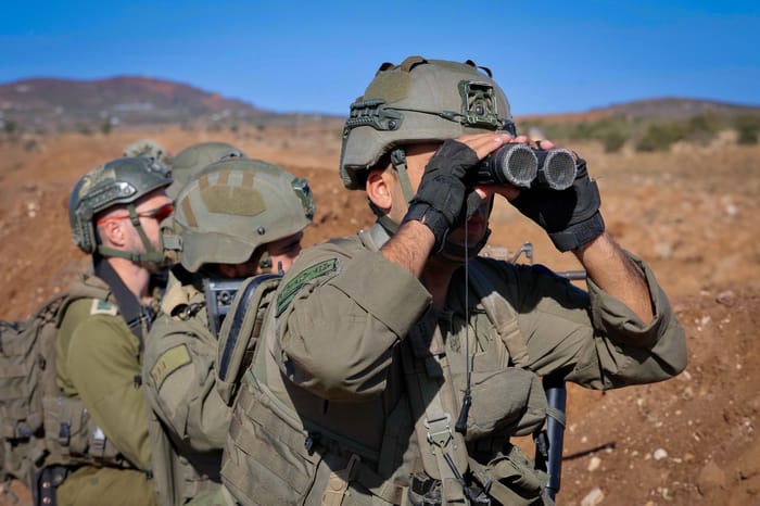 sraeli soldiers working on the border fence with Syria, northern Israel, October 18, 2024.