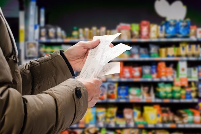 Checking grocery receipts.