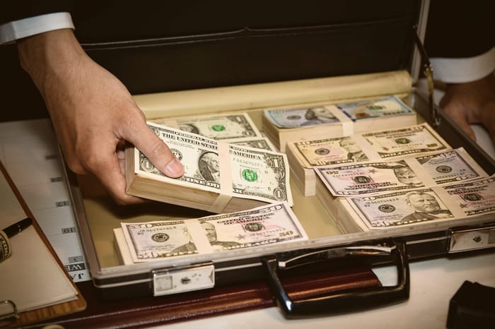 Smuggling money. Illustration.