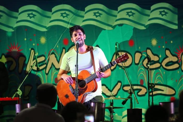 Israeli singer Idan Amedi performs live during Israel's Independence celebrations in Beit Shemesh
