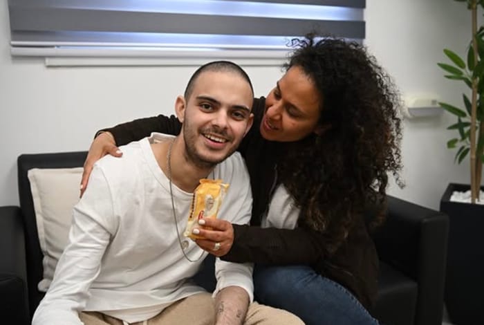 Omer Wenkert with his mother