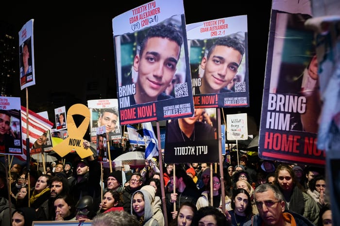 Israelis attend a rally calling for the release of Israelis held hostage by Hamas terrorists in Gaza, at "Hostage Square" in Tel Aviv, February 22, 2025