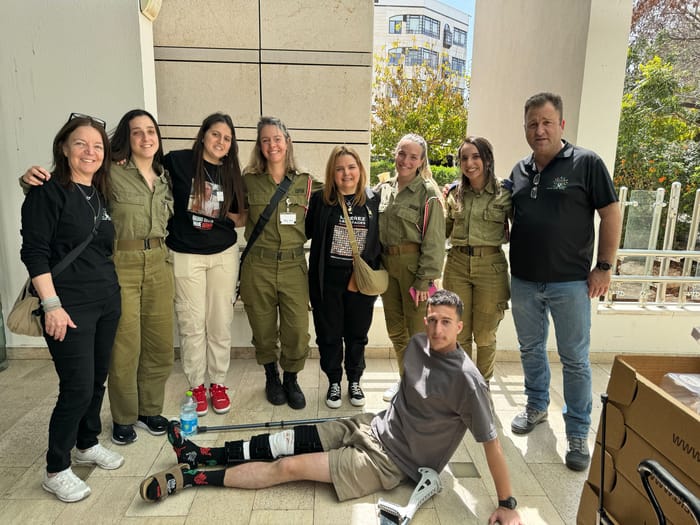 Alon and Ella at the hospital with IDF soldiers