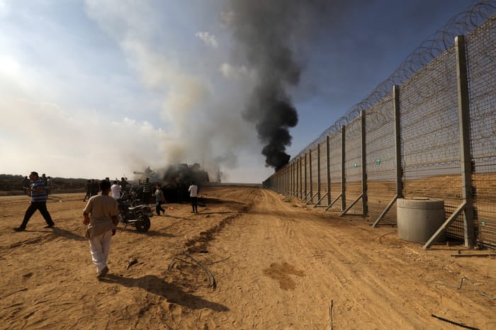 Palestinians storm Israeli territory, east of the city of Khan Yunis, south of the Gaza Strip, October 7, 2023.