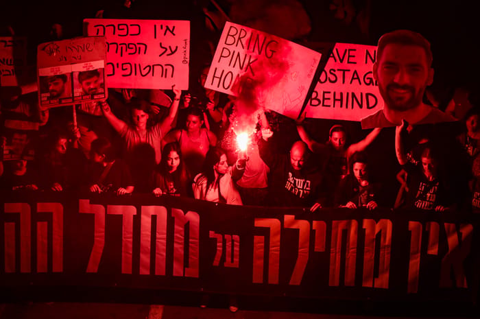 Demonstrators protest for the release of Israelis held hostage in the Gaza Strip, outside Hakirya Base in Tel Aviv, March 15, 2025.