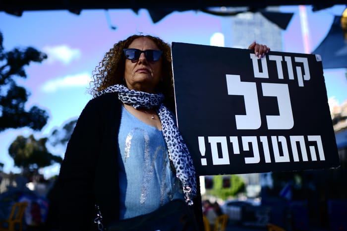 Israelis at the protest tent set up by families of Israelis held kidnapped by Hamas terrorists in Gaza, outside Hakirya Base in Tel Aviv, March 13, 2025.