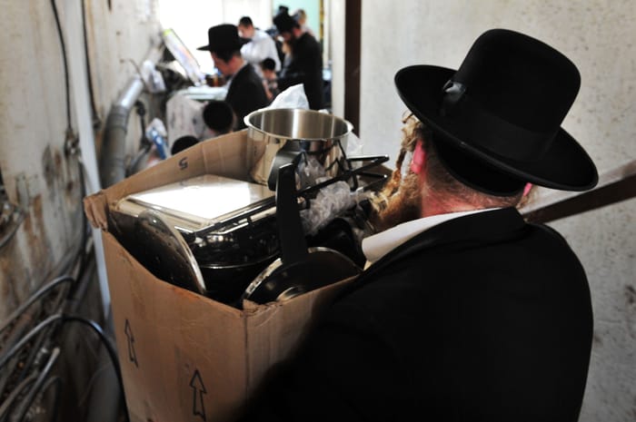Jews preparing for Pesach cleaning