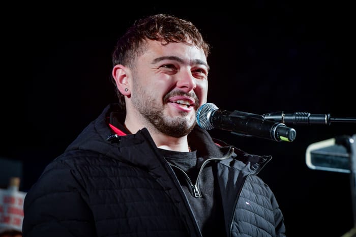Released hostage Almog Meir Jan speaks during a rally calling for the release of Israelis held hostage by Hamas terrorists in Gaza, at "Hostage Square" in Tel Aviv, January 4, 2025. 