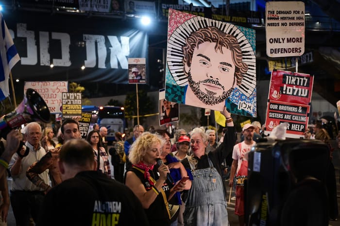 Demonstrators protest for the release of Israelis held hostage in the Gaza Strip, outside Hakirya Base in Tel Aviv, April 2, 2025