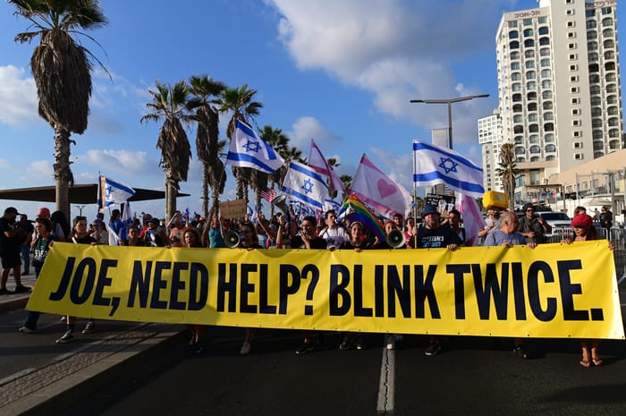 Anti-overhaul activists protest outside the US Embassy in Tel Aviv, as Israeli PM Netanyahu meets with US President Biden, in NYC, September 20, 2023.