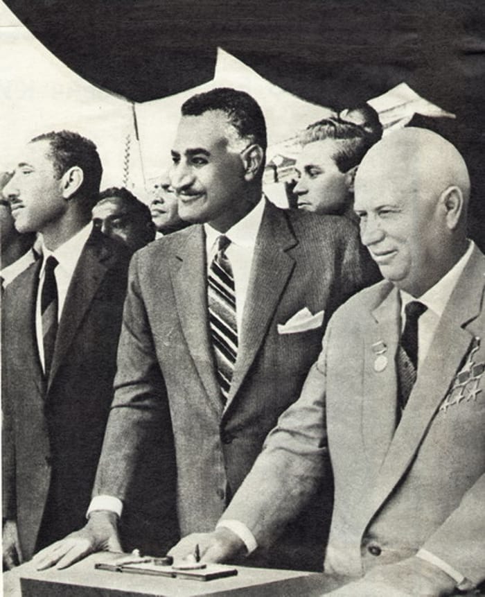 Gamal Abdel Nasser, in the middle