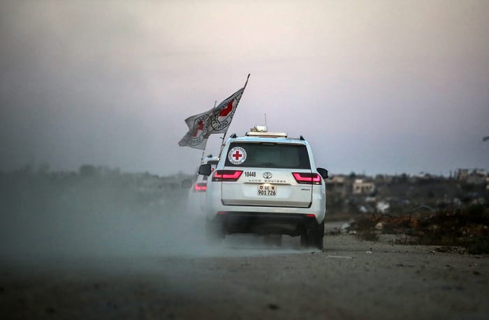 International Red Cross (ICRC) vehicles drive in Deir el-Balah, as they transports US-Israeli hostage Edan Alexander after being released from Hamas captivity on May 12, 2025.