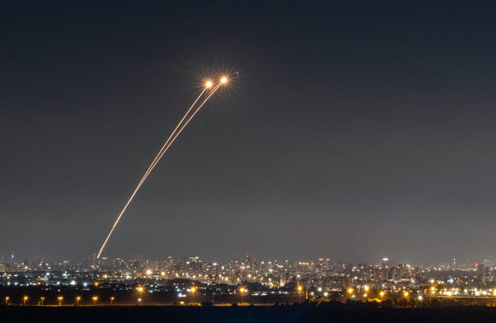 Anti-missile system fires interception missiles as missiles fired from Iran as it seen over central Israel, June 19, 2025.