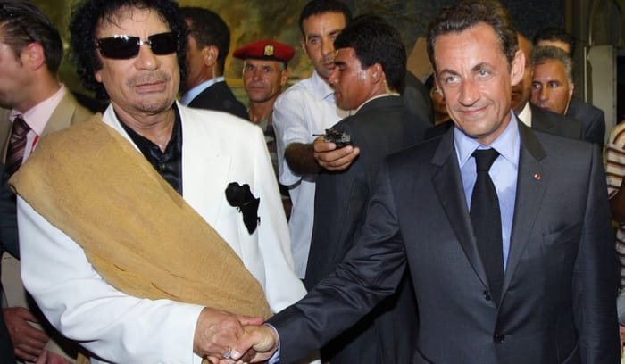 Nicolas Sarkozy and Muammar Gaddafi