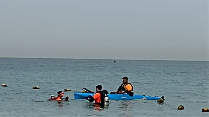 ZAKA volunteers searching for the missing phone