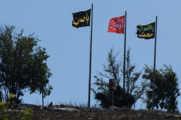 View of flags that were placed by Hezbollah in front of an IDF post on the border on the Border between Israel and Lebanon, northern Israel, August 9, 2023.