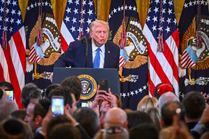 U.S. President Donald Trump attends a Hanukkah reception in the East Room of the White House in Washington, D.C., on December 16, 2025.