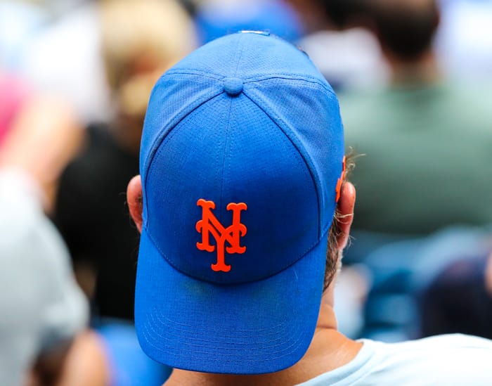 NEW YORK - SEPTEMBER 8, 2019: Fan wears New York Mets hat in New York
