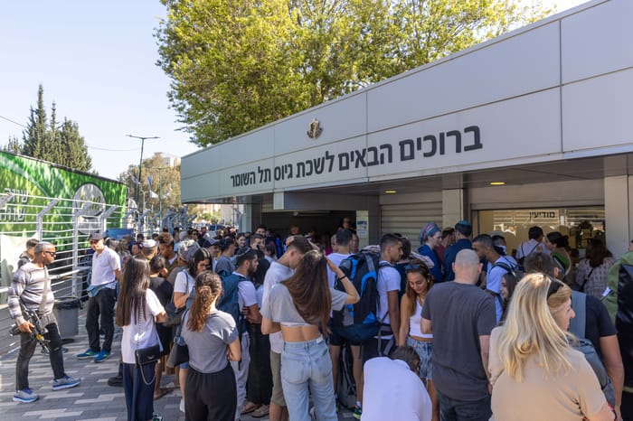 Young Israelis arrive at the IDF Bakum Reception and Sorting base in Tel Hashomer in Israel, on April 18, 2024.