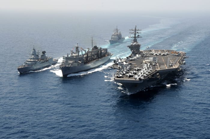 Aircraft Carrier with Naval fleet