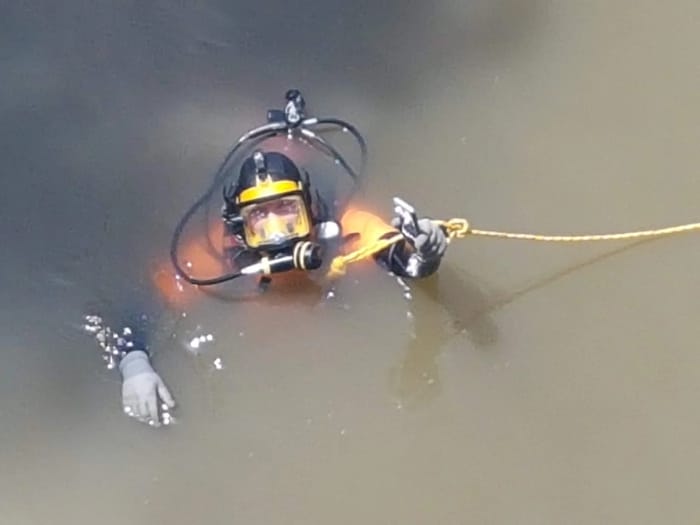 ZAKA diver find missing phones in Yarkon river