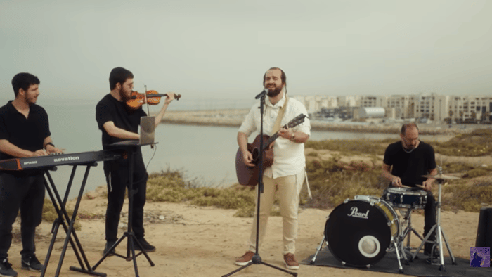 Avraham Yitzchak singing the new song.