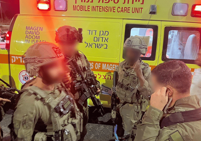 IDF soldiers at the site of a terror attack. Illustration.