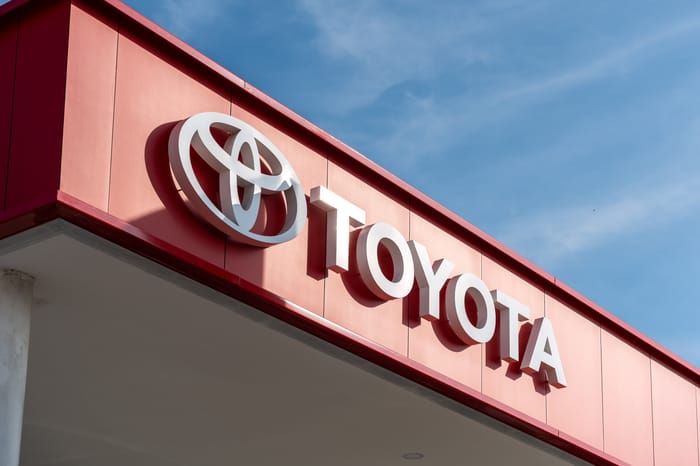 The Toyota logo on the side of a building.