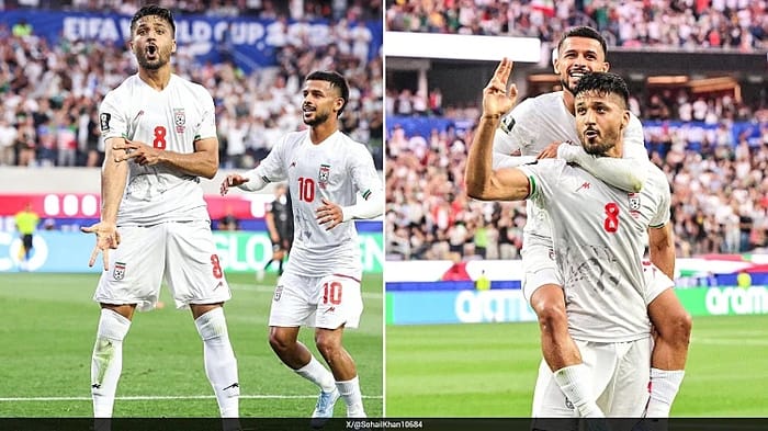 Iranian soccer player in defiant gun gesture