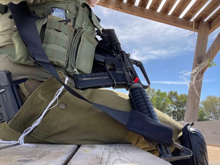 A haredi soldier secures one of the springs in the area