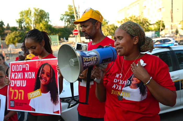 Haimanot Kasso's parents outside Shin Bet headquarters