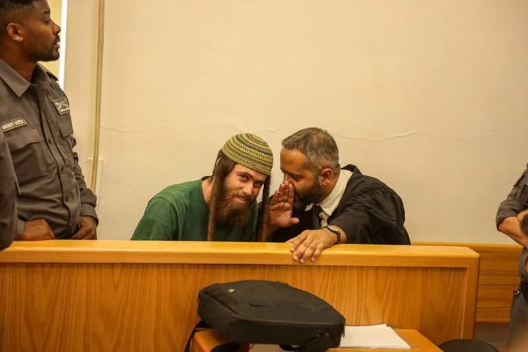 Yered with his lawyer at the district court