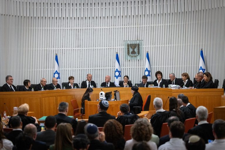 High Court of Justice judges in a discussion on the Clause of Reasonability