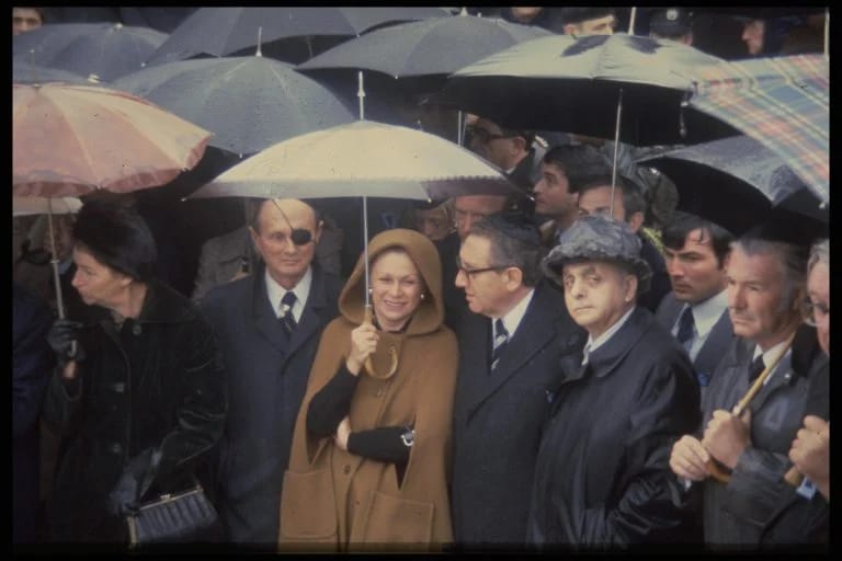 At Golda Meir's funeral. Next to him is Moshe Dayan