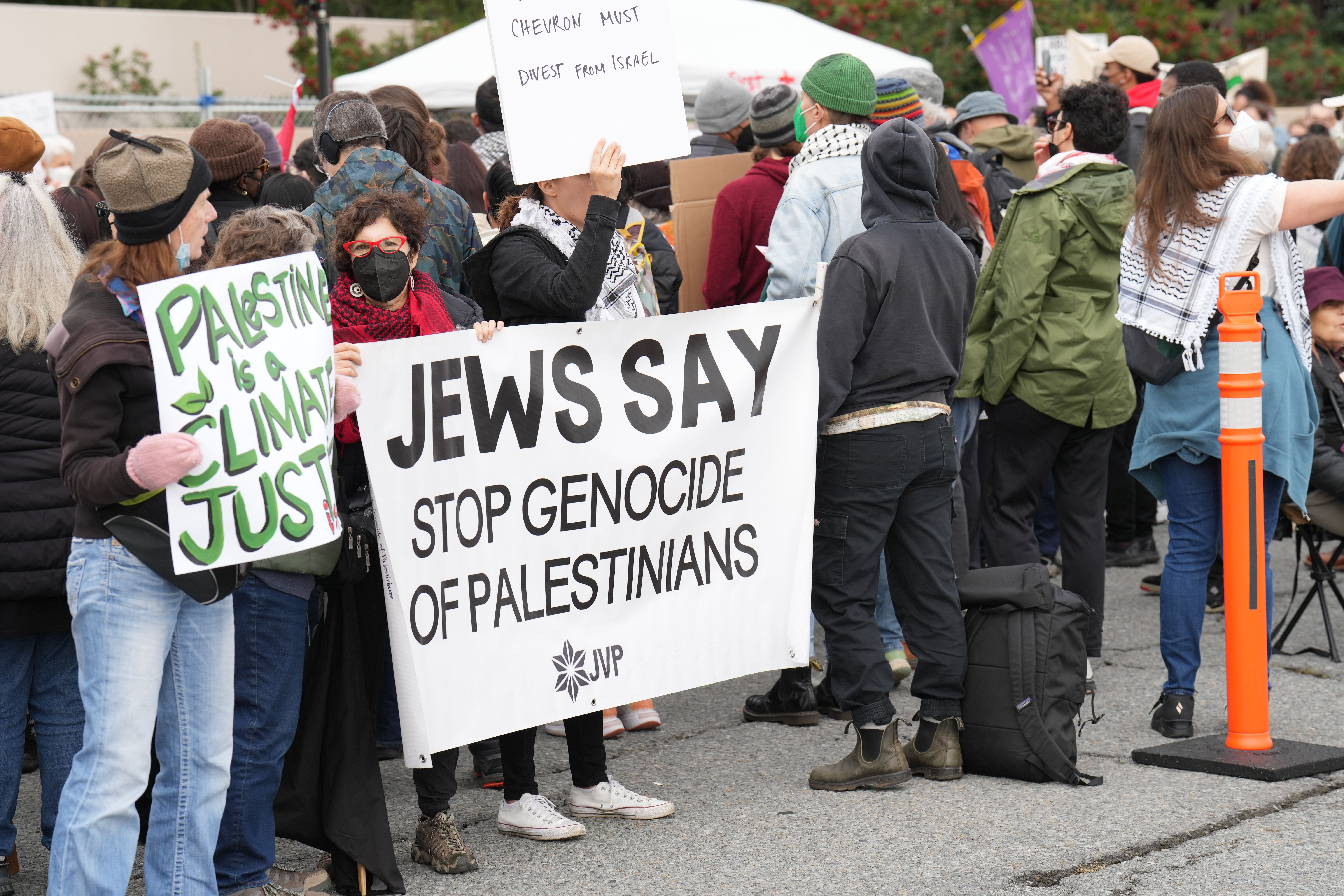 Protesters at the Chevron refinery call upon the giant corporation to divest from its natural gas fields in Israel