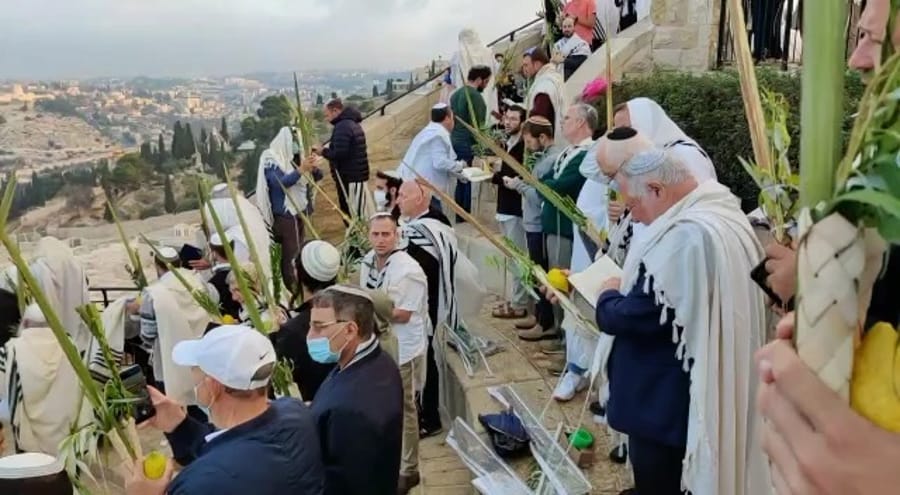 Holiday prayer in front of the old city. Archive