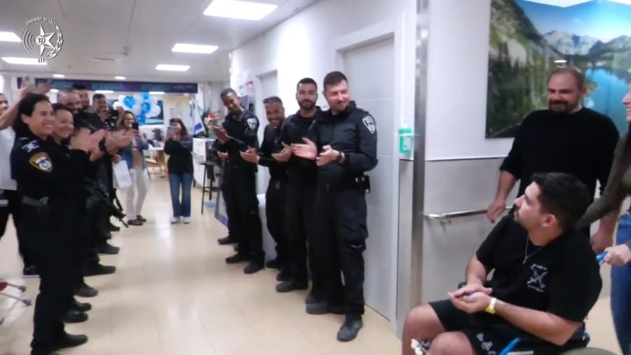 A visit from colleagues and friends for heroism.