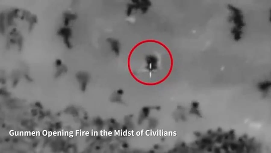 Hamas gunmen captured on film firing on civilians.